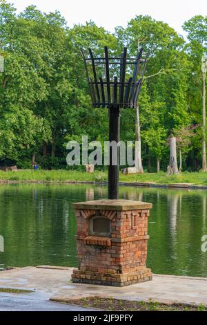 Boultham Park, Lincoln, Originally the park for the Boultham Hall, opened as a public park for the people of Lincoln, Park beacon, Beacon beside lake. Stock Photo