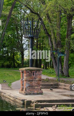 Boultham Park, Lincoln, Originally the park for the Boultham Hall, opened as a public park for the people of Lincoln, Park beacon, Beacon beside lake. Stock Photo