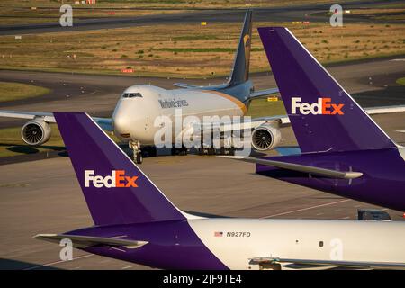 Cologne-Bonn Airport, CGN, cargo planes are parked in front of the air cargo centre, being loaded and unloaded, UPS Boeing 747 cargo jumbo jet taxis f Stock Photo