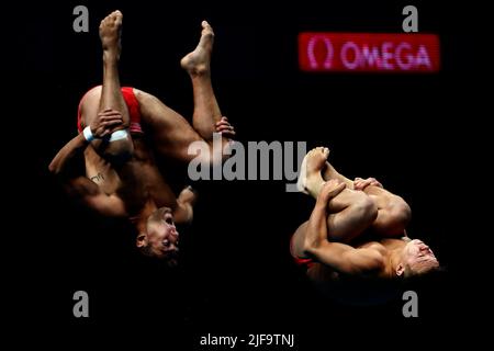 Budapest, Hungary, 28th June 2022. Anton Knoll and Dariush Lotfi of Austria compete in the Men's 10m Synchronised on day three of the Budapest 2022 FINA World Championships at Alfred Hajos National Aquatics Complex in Budapest, Hungary. June 28, 2022. Credit: Nikola Krstic/Alamy Stock Photo