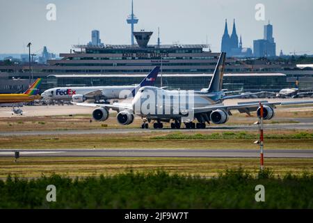 Cologne-Bonn Airport, CGN, UPS cargo aircraft, Boeing 747 jumbo jet, on landing, tower at the German Air Traffic Control terminal, Cologne Cathedral, Stock Photo
