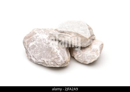 Stack white of granite rock stones isolated on white background Stock Photo