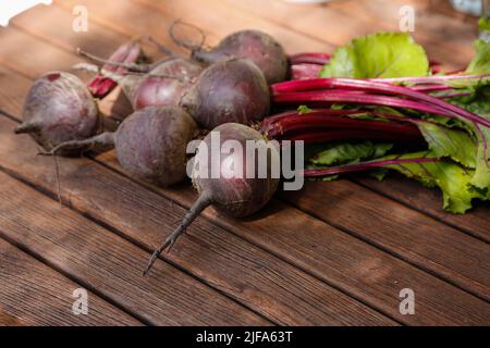 Southern German cuisine, preparation walnut cake with beetroot (Beta vulgaris), beetroot-carrot nut cake, raw beetroot, wooden board, vegetables Stock Photo