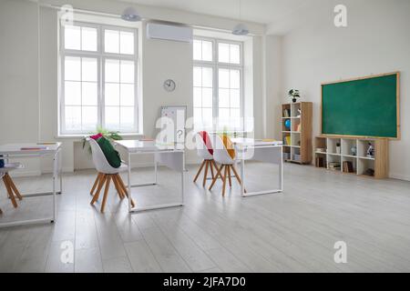 Interior of modern light class elementary, middle school or high school without teacher and students Stock Photo