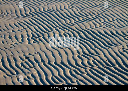 Abstract patterns on a beach Stock Photo