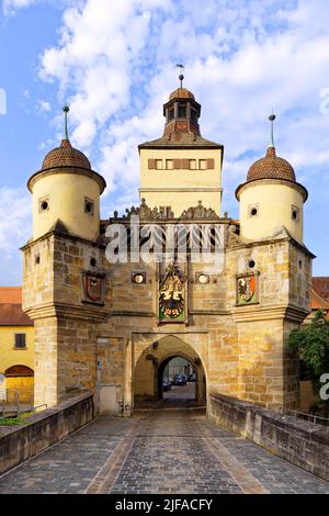 Ellinger Tor, town gate in warm early morning sun, built gate tower 14th century, forework and flanking towers around 1510, top floor 17th century Stock Photo