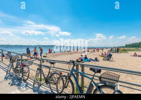 Falkenstein beach, windjammer parade spectators, leisure, swimming, parasol, bicycles, wheelchair, summer, blue skies, Kiel Week 2022, Kiel, Baltic Stock Photo