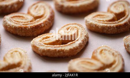 Palmier cookies or puff pastry ears concept Stock Photo
