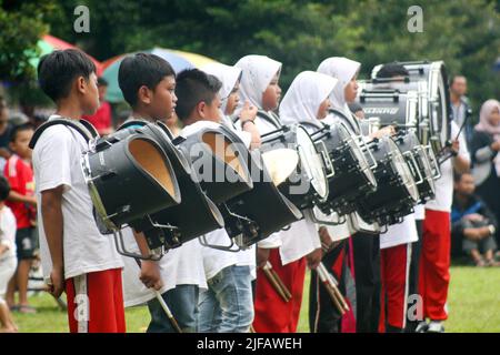 some students are practicing marching band with various musical instruments Stock Photo