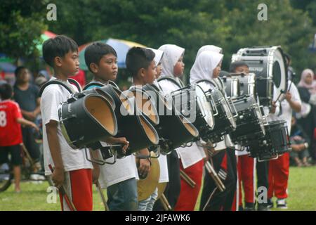 some students are practicing marching band with various musical instruments Stock Photo