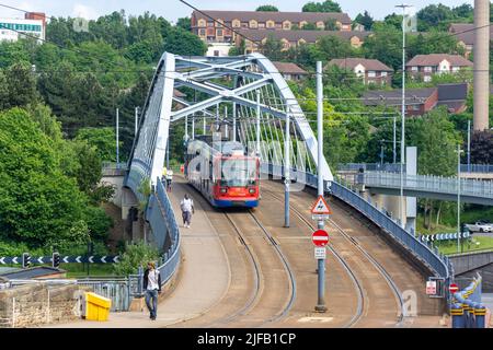 Sheffield Supertram crossing Park Square Bridge, Sheffield, South Yorkshire, England, United Kingdom Stock Photo