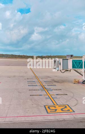Jetway waiting for a plane to arrive on airport.airport terminal boarding gate. Travel Concept. Stock Photo