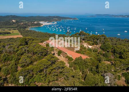 France, Var, Iles d'Hyeres, Parc National de Port Cros (National park of Port Cros), Porquerolles island, Orthodox Monastery of Santa Maria in the former Fort of Repentance, the Sainte-Agathe castle overlooking the port in the background (aerial view) Stock Photo