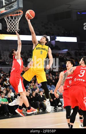 Melbourne, Australia. 1st July, 2022. William McDowell-White (2nd L) of Australia lays the ball up during a Group B match between Japan and Australia of Basketball World Cup Asian Qualifiers in Melbourne, Australia, July 1, 2022. Credit: Bai Xue/Xinhua/Alamy Live News Stock Photo
