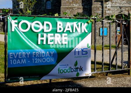 Sign for the weekly Food Bank in Mullion Village in Cornwall, UK. Stock Photo