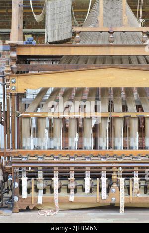 France, Nord, Roubaix, La Manufacture (museum of memory and textile creation) installed in the former premises of the Craye et fils textile company (early 20th century), ribbon maker (loom for weaving ribbons from the end of the 19th century ) Stock Photo