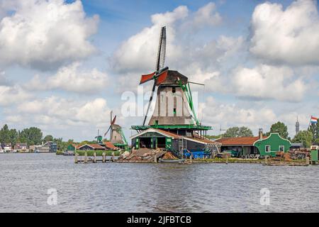 Old windmill in Zaan Schans countryside close to Amsterdam