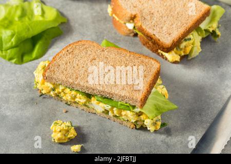 Healthy Homemade Egg Salad Sandwich with Lettuce Stock Photo