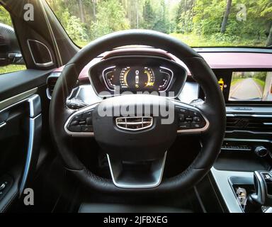 Minsk, Belarus-June 2022: Geely Coolray's car steering wheel and dashboard. Stock Photo