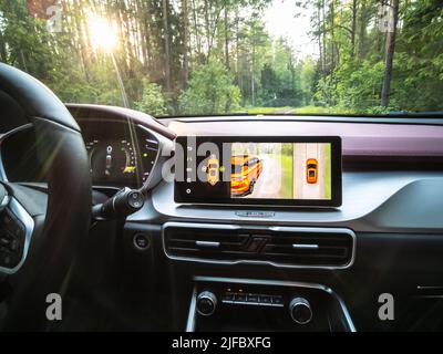 Minsk, Belarus - June 2022: Geely SUV media system screen Geely Coolray car. Stock Photo