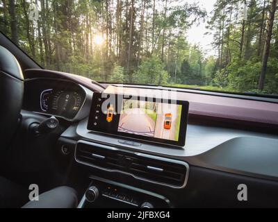 Minsk, Belarus - June 2022: Geely SUV media system screen Geely Coolray car. Stock Photo