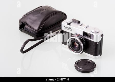 Vintage film rangefinder camera with black leather case. Stock Photo