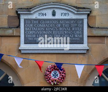 Helmsley, UK - June 5th 2022: Plaque in Helmsley in Yorkshire, UK, dedicated to the comrades of the 21st S Battalion Kings Royal Rifle Corps who gave Stock Photo