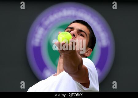 London, UK. 01st July, 2022. Ist July 2022, All England Lawn Tennis and Croquet Club, London, England; Wimbledon Tennis tournament; Carlos Alcaraz serves to Oscar Otte in the mens singles Credit: Action Plus Sports Images/Alamy Live News Stock Photo