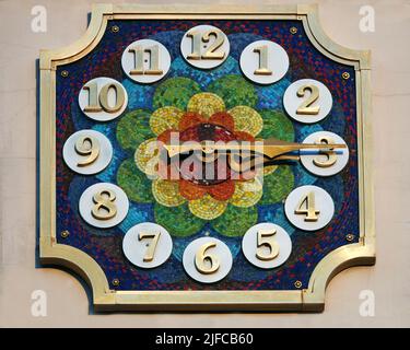 Big clock on the city building of the puppet theater in Kiev Stock Photo