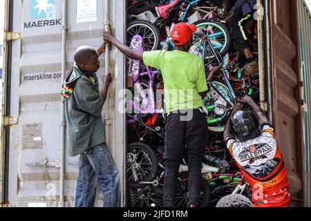 People seen unloading second hand bicycle parts imported from the