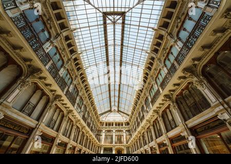 Turin, Italy. June 16, 2022. Low angle view of Galleria Subalpina vault eclectic style shopping building by Pietro Carrera Stock Photo
