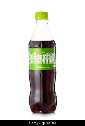 LONDON,UK - MAY 23, 2022: Bottle of Coca Cola Lime on white.Green label Stock Photo