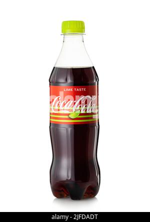 LONDON,UK - MAY 23, 2022: Coca Cola with lime taste in plastic bottle on white. Stock Photo