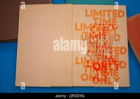 Limited Time Only word in opened book with vintage, natural patterns ...