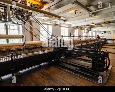 Quarry Bank Mill (also known as Styal Mill) in Styal, Cheshire, in northwest England. It is one of the best preserved textile factories of the Industr Stock Photo