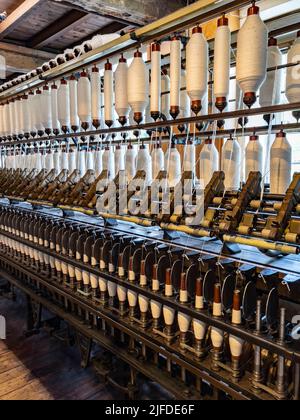 Quarry Bank Mill (also known as Styal Mill) in Styal, Cheshire, in northwest England. It is one of the best preserved textile factories of the Industr Stock Photo