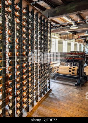 Quarry Bank Mill (also known as Styal Mill) in Styal, Cheshire, in northwest England. It is one of the best preserved textile factories of the Industr Stock Photo
