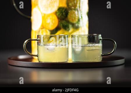 Chilled citrus fruit mix, cool and fruity cold drink making process - stock photo Stock Photo