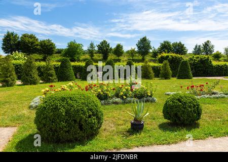 Garden around Chinese Palace and Grand Palace in Zolochiv Castle, a residence of the Sobieski noble family on a hill . Zolochiv, Ukraine. Stock Photo