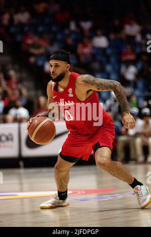 Hamilton, Canada, July 01, 2022: Kassius Robertson of Team Canada drives the ball up court during the FIBA World Cup qualifying game (Window 3) against Team Domnican Republic at First Ontario Centre in Hamilton, Canada. Canada won the game with the score 95-75. Credit: Phamai Techaphan/Alamy Live News Stock Photo