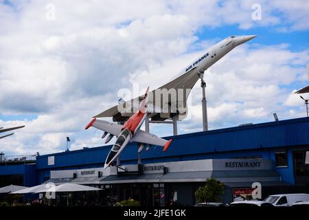 SINSHEIM, GERMANY - MAI 2022: white supersonic airliner Concorde F-BVFB 1969 and gray orange Aero L-39 Albatros 1968 Stock Photo