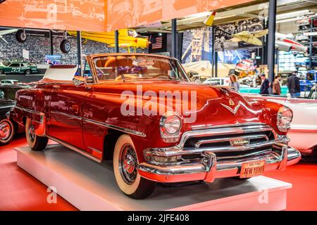 SINSHEIM, GERMANY - MAI 2022: red cabrio Chrysler New Yorker De Luxe Convertible 1954 235ps Stock Photo
