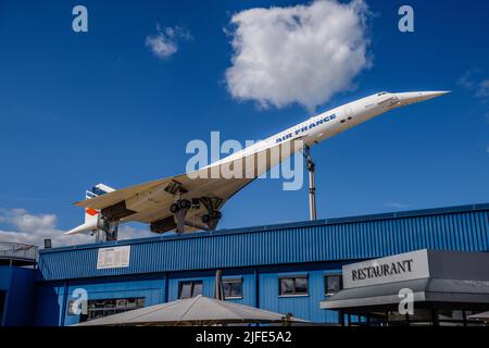 SINSHEIM, GERMANY - MAI 2022: white supersonic airliner Concorde F-BVFB 1969 and gray orange Aero L-39 Albatros 1968 Stock Photo