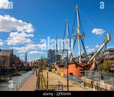London, UK - March 17th 2022: Replica ships at the historic Tobacco Dock in Wapping, London, UK.  The view also show Ornamental Canal Wapping and the Stock Photo