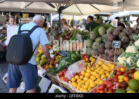 Copenhagen/Denmark/.02 July  2022/.Fruit and vegetable  shoppers at oudoor fruit and vegetable vendor at Torvehallerne in danish capital.(Photo..Francis Dean/Dean Pictures) Stock Photo