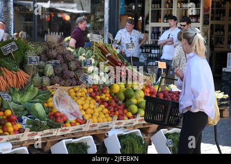 Copenhagen/Denmark/.02 July  2022/.Fruit and vegetable  shoppers at oudoor fruit and vegetable vendor at Torvehallerne in danish capital.(Photo..Francis Joseph Dean/Dean Pictures) Stock Photo