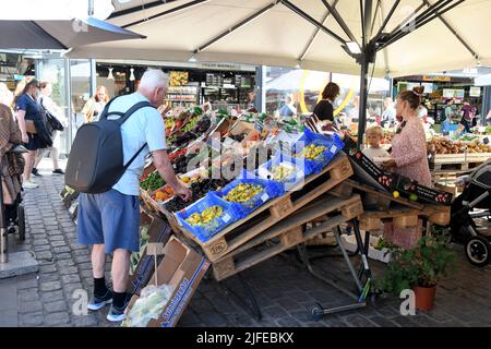 Copenhagen/Denmark/.02 July  2022/.Fruit and vegetable  shoppers at oudoor fruit and vegetable vendor at Torvehallerne in danish capital.(Photo..Francis Joseph Dean/Dean Pictures) Stock Photo