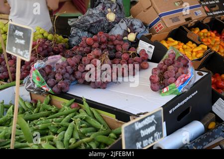 Copenhagen/Denmark/.02 July  2022/.Fruit and vegetable  shoppers at oudoor fruit and vegetable vendor at Torvehallerne in danish capital.(Photo..Francis Joseph Dean/Dean Pictures) Stock Photo