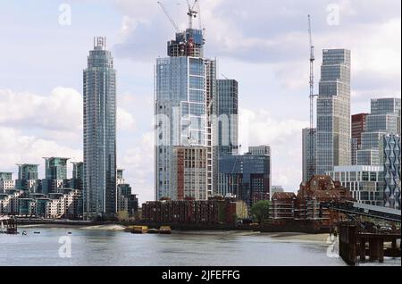 New skyscrapers and apartment buildings at Nine Elms, in the London Borough of Wandsworth, on the South Bank of the River Thames Stock Photo