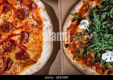 A freshly baked pizza with lots of toppings Stock Photo